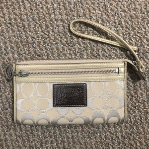 Brand new Coach wristlet with credit card slits took tags off but never used